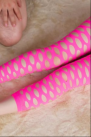 Pink pantyhose brunette Yuma Miyazaki gets her legs and toes fucked on camera